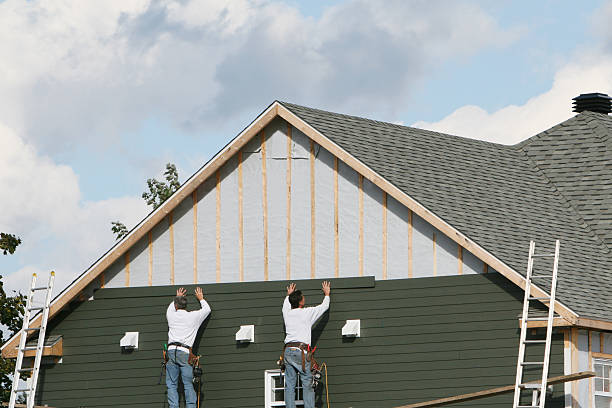 Professional Siding technician working in Fayetteville, OH